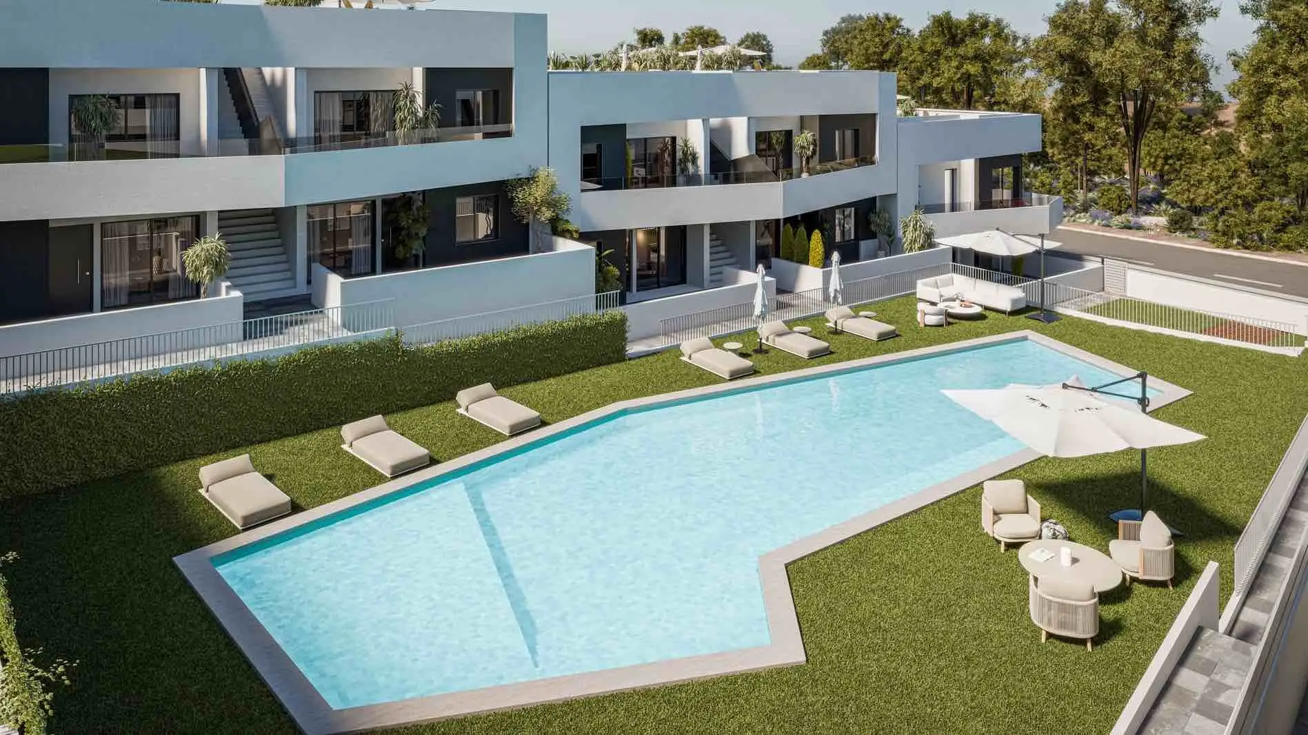 Aerial view over the communal pool and landscaped gardens